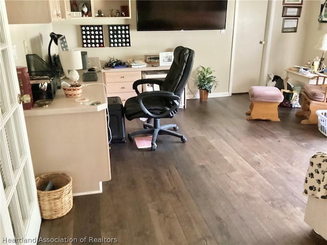 office area with dark hardwood / wood-style floors