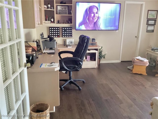2831 Sunrise Dr, Sebring, FL 33872 - office area featuring baseboards and dark wood-type flooring