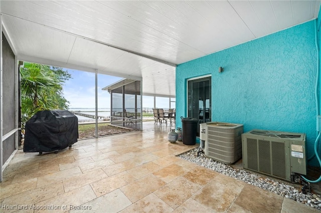 sunroom with plenty of natural light