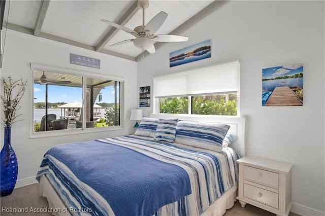 457 Lake June Rd, Lake Placid, FL 33852 - bedroom with multiple windows, baseboards, and a ceiling fan