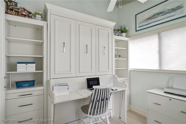 457 Lake June Rd, Lake Placid, FL 33852 - home office featuring a ceiling fan, built in study area, and baseboards