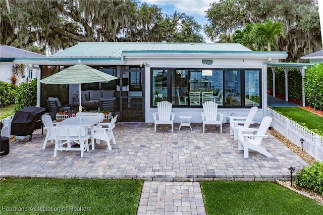 457 Lake June Rd, Lake Placid, FL 33852 - view of patio / terrace with a sunroom