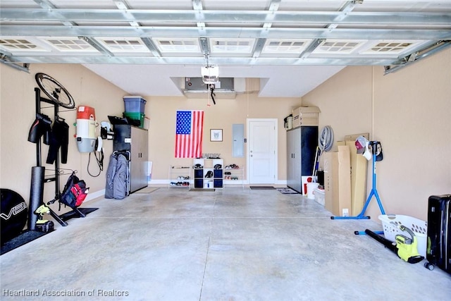 3013 Royal Oaks Ct, Sebring, FL 33875 - garage featuring electric panel and a garage door opener