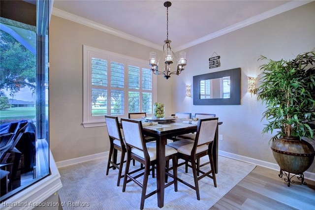 3013 Royal Oaks Ct, Sebring, FL 33875 - dining room with a chandelier, crown molding, and light wood-type flooring