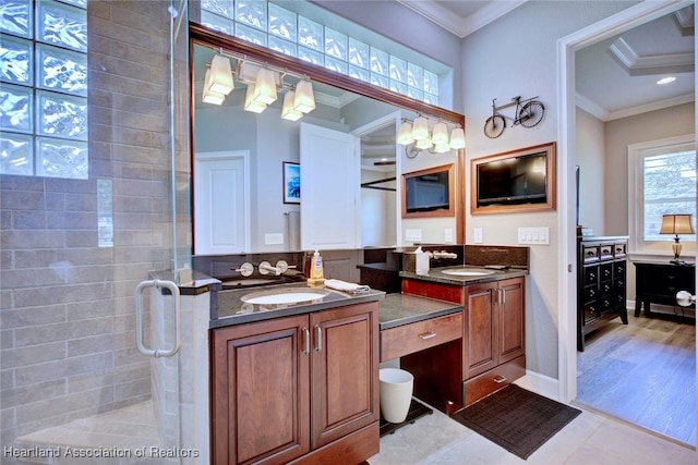 3013 Royal Oaks Ct, Sebring, FL 33875 - bathroom with two vanities, a stall shower, and ornamental molding