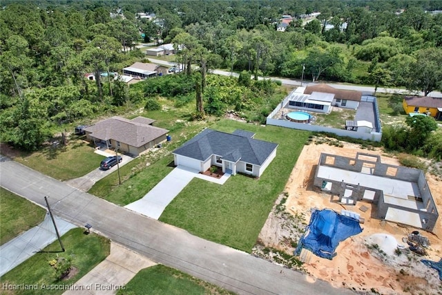 4001 Simca St, Sebring, FL 33872 - aerial view of a pool and a forest