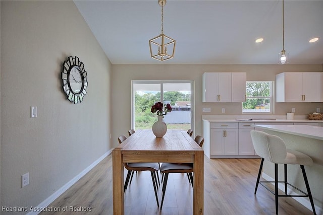 4001 Simca St, Sebring, FL 33872 - dining space with light wood finished floors, baseboards, and recessed lighting