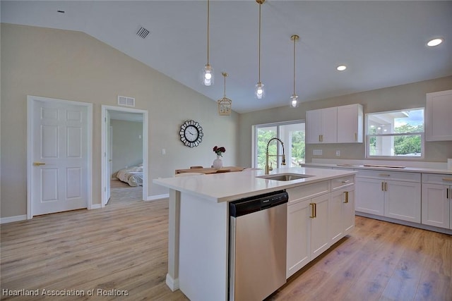 4001 Simca St, Sebring, FL 33872 - kitchen with dishwasher, a sink, light countertops, plenty of natural light, and vaulted ceiling