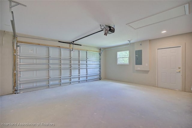 4001 Simca St, Sebring, FL 33872 - garage with electric panel, a garage door opener, and recessed lighting