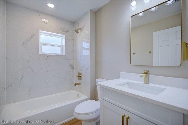 4001 Simca St, Sebring, FL 33872 - bathroom with toilet, vanity, and bathing tub / shower combination