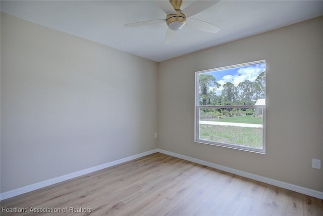 4001 Simca St, Sebring, FL 33872 - empty room featuring baseboards, light wood finished floors, and ceiling fan