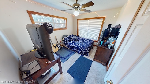 office space with carpet and ceiling fan