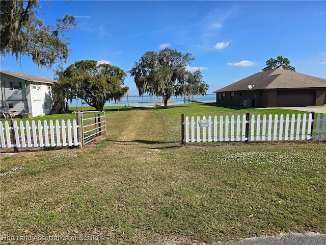 view of yard with a water view