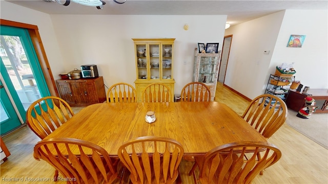 dining space featuring light hardwood / wood-style flooring