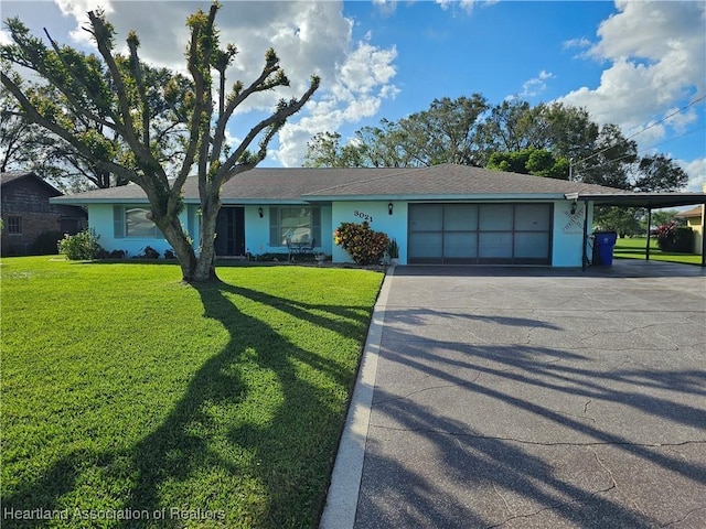 single story home with a carport and a front yard