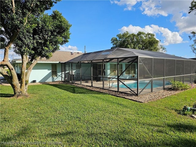 view of swimming pool with a lawn and glass enclosure