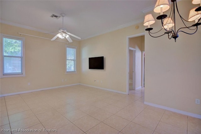 interior space featuring light tile patterned floors, visible vents, a healthy amount of sunlight, and ornamental molding