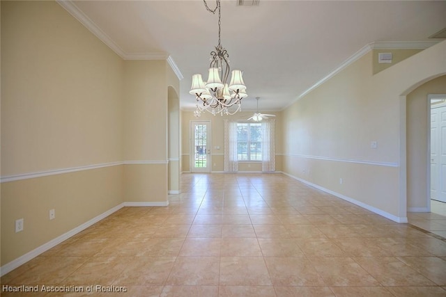 spare room featuring baseboards, arched walkways, ornamental molding, and light tile patterned flooring