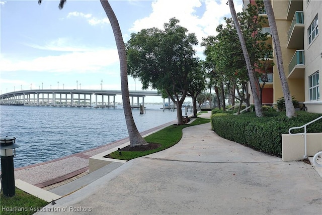 view of home's community with a water view