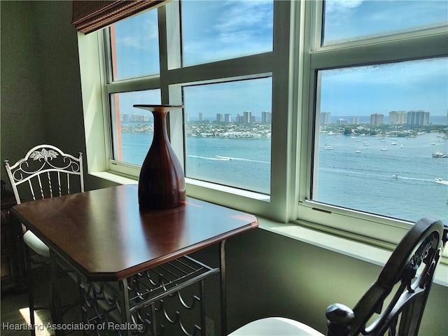 dining area with a water view