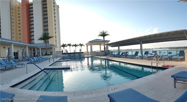 view of swimming pool with a patio