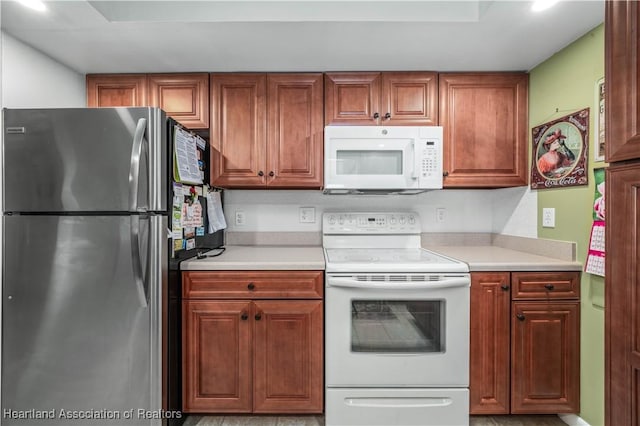 kitchen featuring white appliances