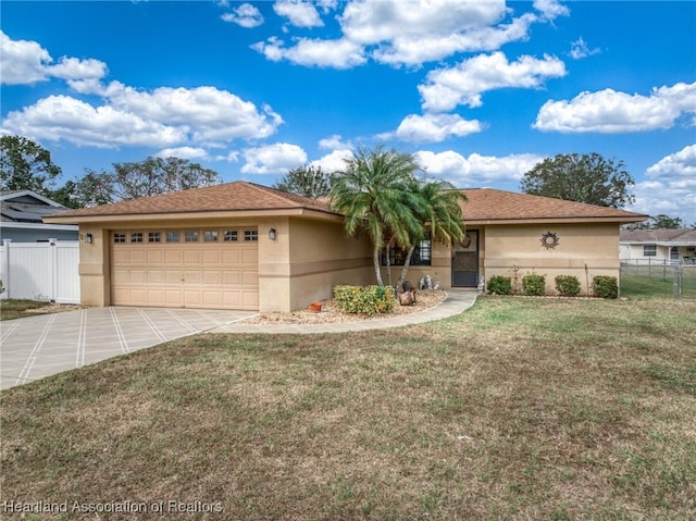 single story home with a front yard and a garage