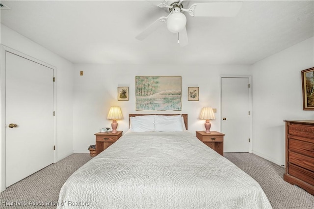 carpeted bedroom featuring ceiling fan