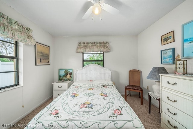 bedroom featuring ceiling fan and carpet floors