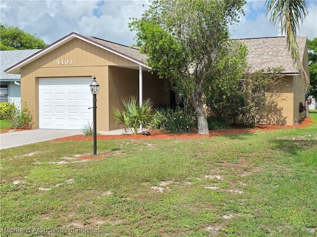 4101 Elson Ave, Sebring, FL 33875 - view of front facade featuring a garage, a front lawn, driveway, and stucco siding