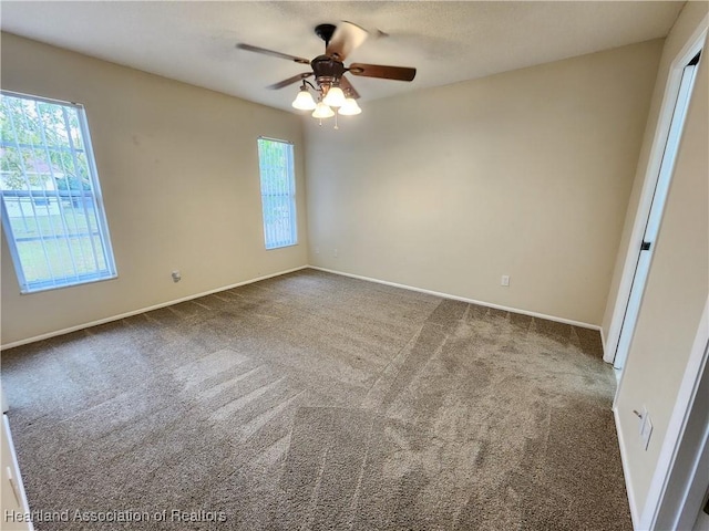4101 Elson Ave, Sebring, FL 33875 - carpeted empty room featuring ceiling fan and baseboards