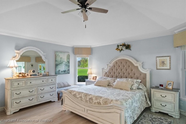 bedroom with ceiling fan, crown molding, and light hardwood / wood-style flooring