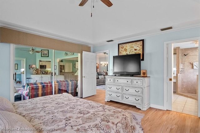 bedroom with connected bathroom, light hardwood / wood-style floors, ceiling fan, and crown molding