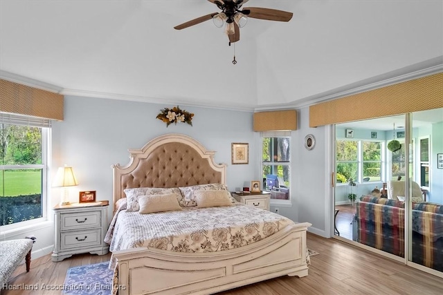 bedroom featuring ceiling fan, crown molding, and light hardwood / wood-style floors