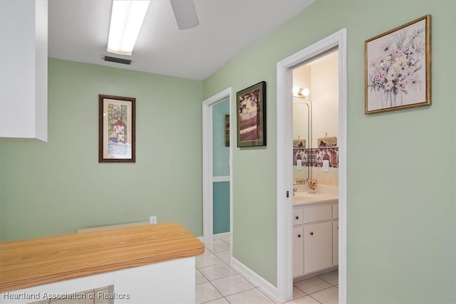 interior space featuring light tile patterned floors