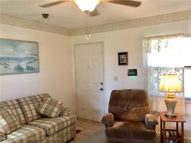 living room with ceiling fan