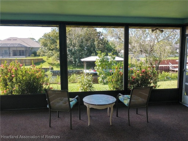 sunroom featuring plenty of natural light