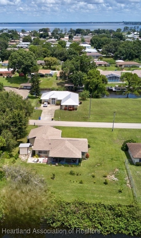 drone / aerial view with a water view