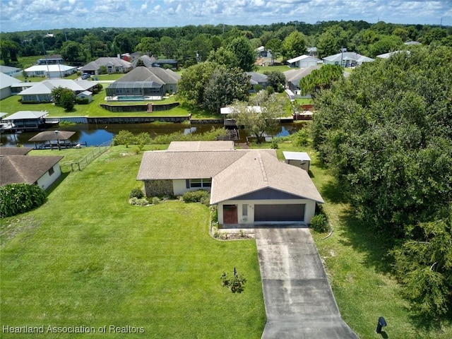 bird's eye view with a water view