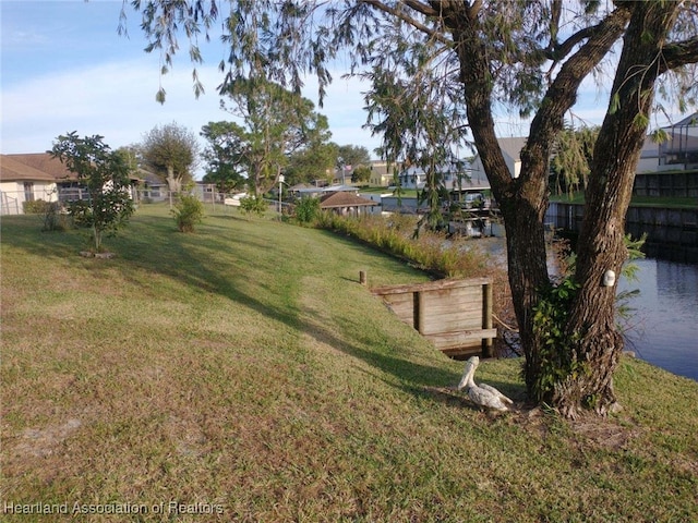 view of yard featuring a water view