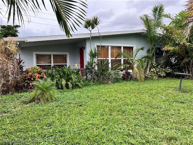 exterior space with a lawn