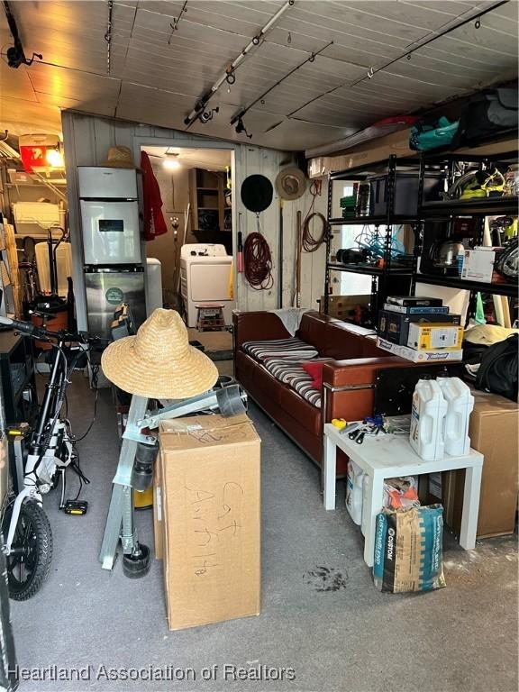 storage area with washer / clothes dryer