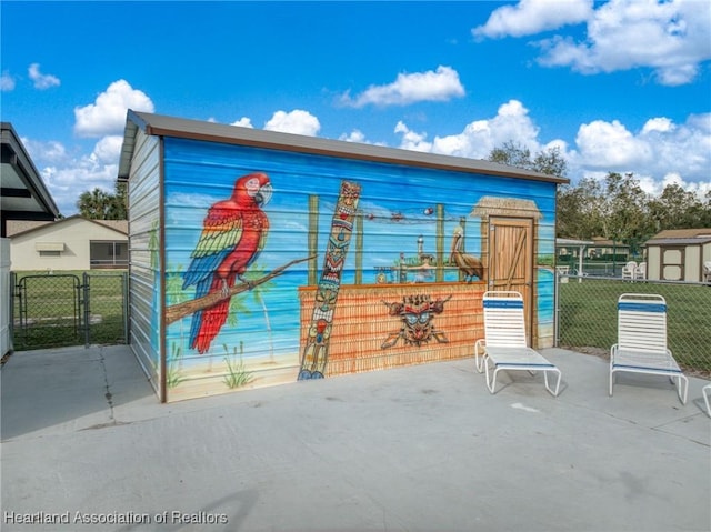 exterior space featuring a storage unit