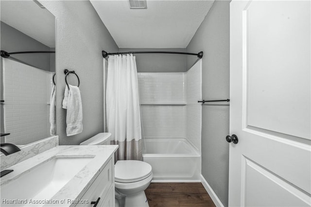 full bathroom featuring vanity, toilet, wood-type flooring, and shower / bath combo with shower curtain