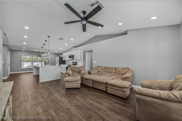 living room with sink, vaulted ceiling, dark hardwood / wood-style floors, and ceiling fan