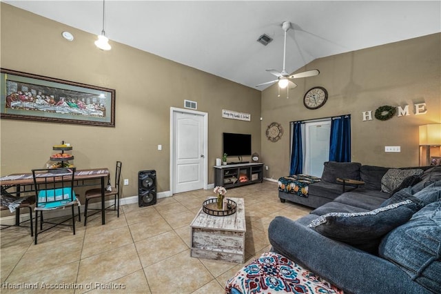 living room featuring light tile patterned floors, baseboards, and visible vents