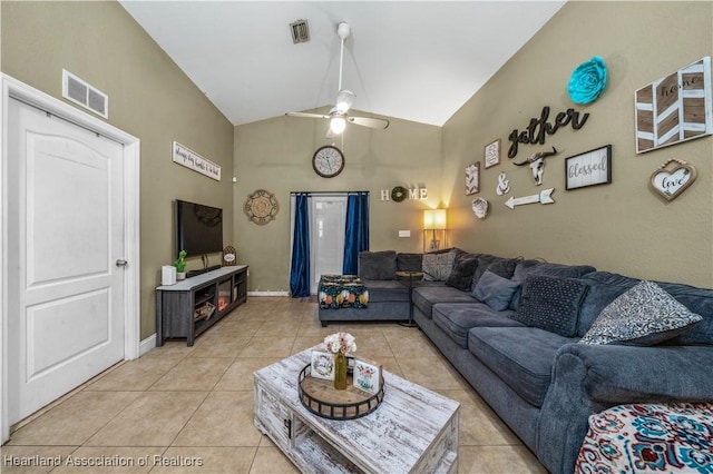 living area with lofted ceiling, light tile patterned floors, a ceiling fan, and visible vents