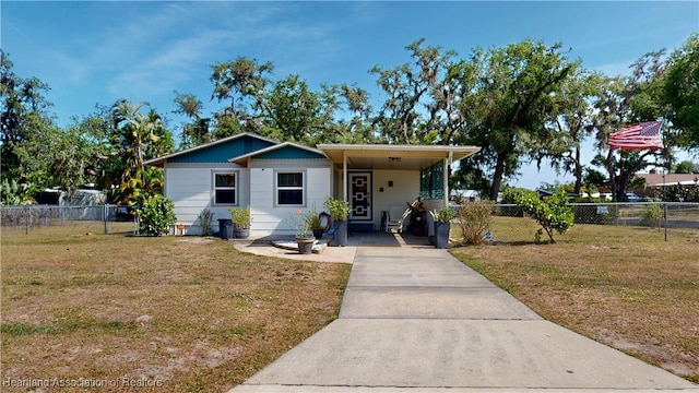 1102 W Gibson St, Arcadia, FL 34266 - view of front of home with concrete driveway and an attached carport
