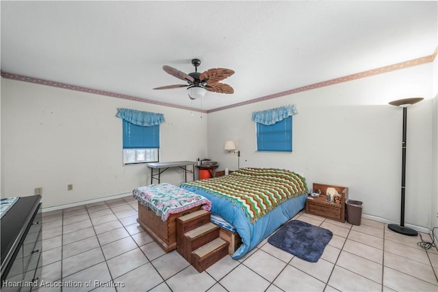 bedroom with ceiling fan, crown molding, and light tile patterned flooring