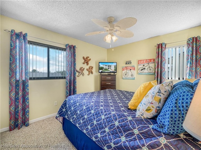 5514 Matanzas Dr, Sebring, FL 33872 - bedroom featuring ceiling fan, carpet floors, and a textured ceiling